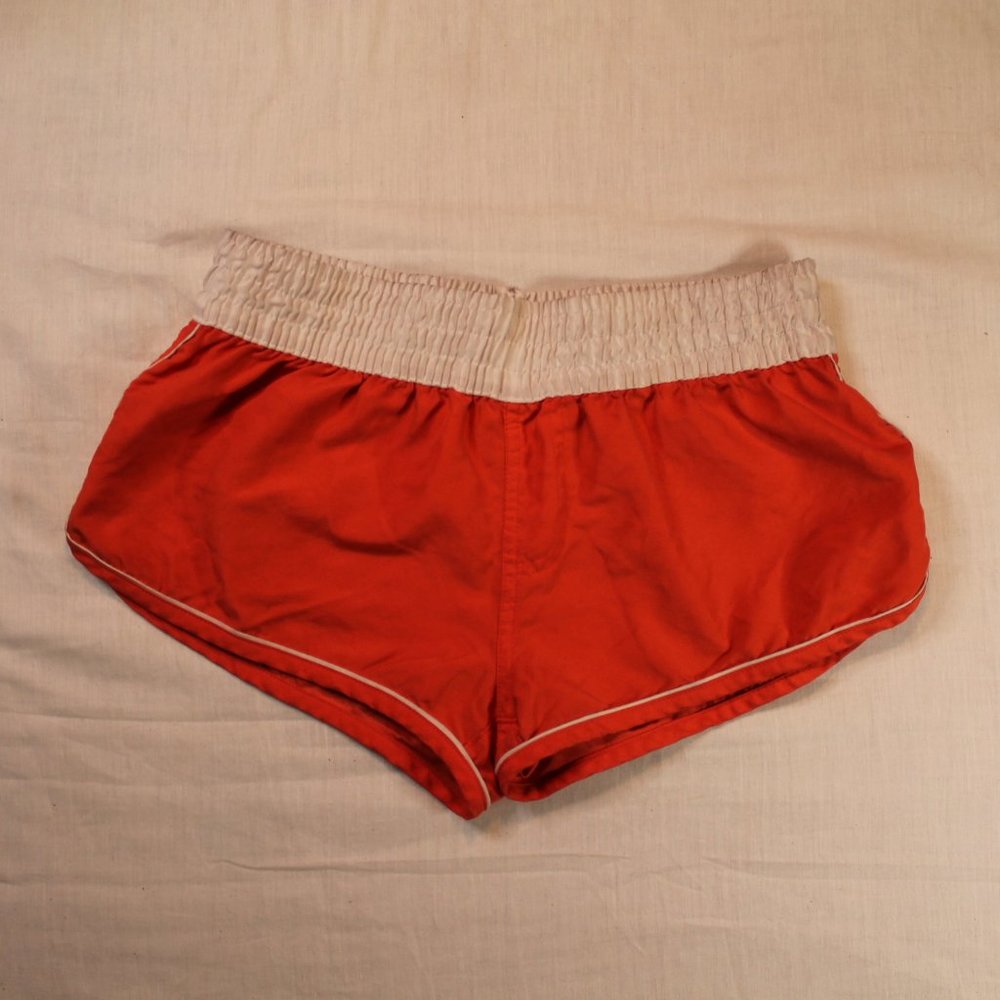 Orange and white swim shorts xs